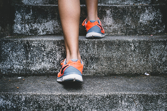 Athlete runs up stairs